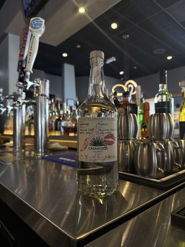 Inside The District Bites N Brew — warm, welcoming atmosphere